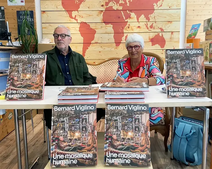 Mario Del Curto et Eliane Junod présentant le livre consacré à Bernard Viglino