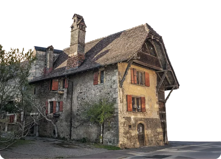 Maison bernoise traditionnelle en pierre avec toit à pans et volets rouges, ancienne bâtisse rurale